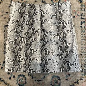 Mini snakeskin leather skirt